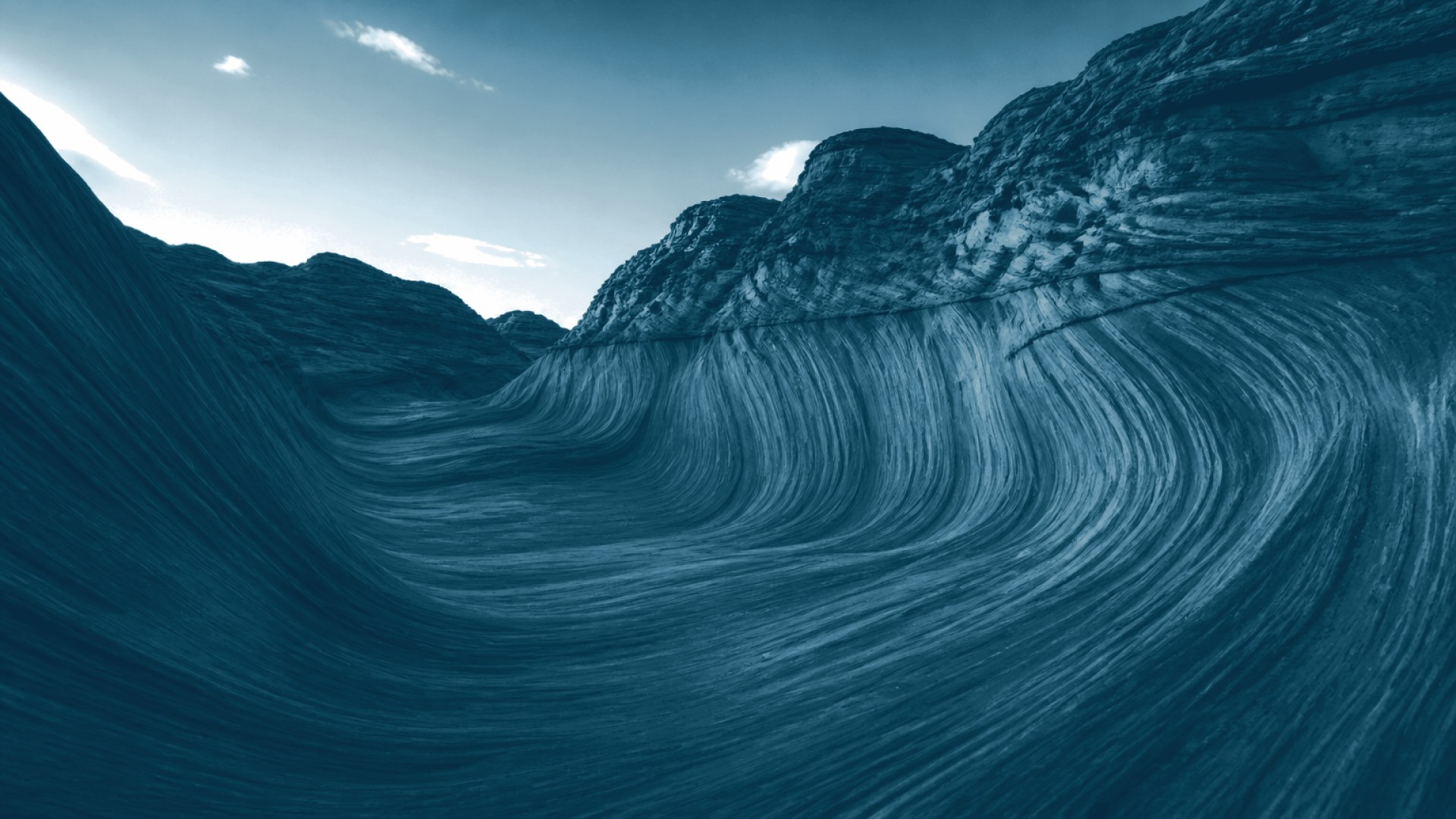 Cânion com camadas de rocha como ondas sonoras ao entardecer